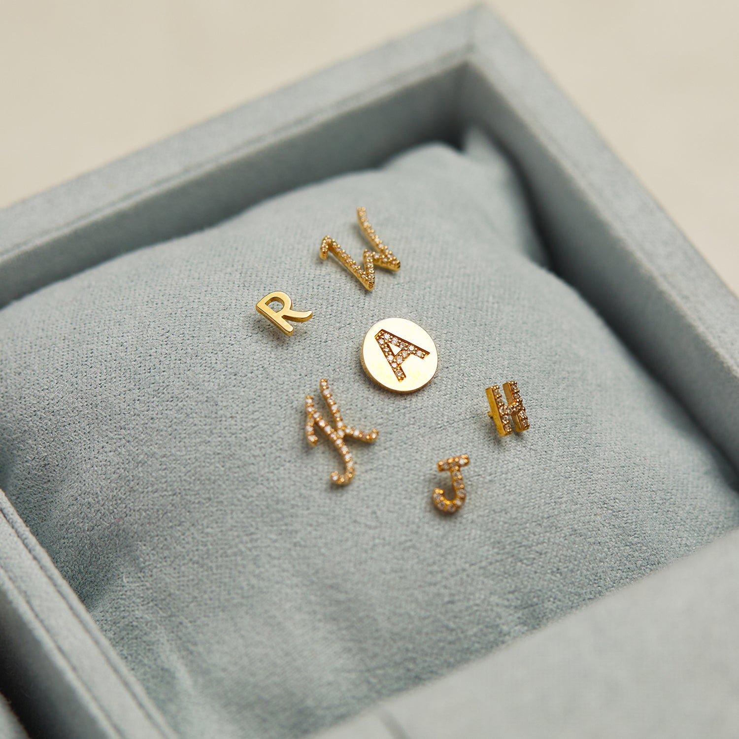 Diamond Pave Script Letter Stud Q84673